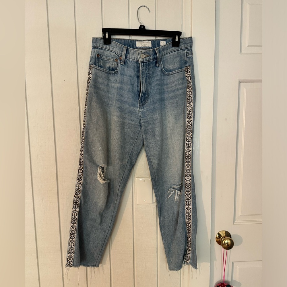 Lucky Brand Relaxed Taper Jeans (size 4/27) with black and white piping detail
